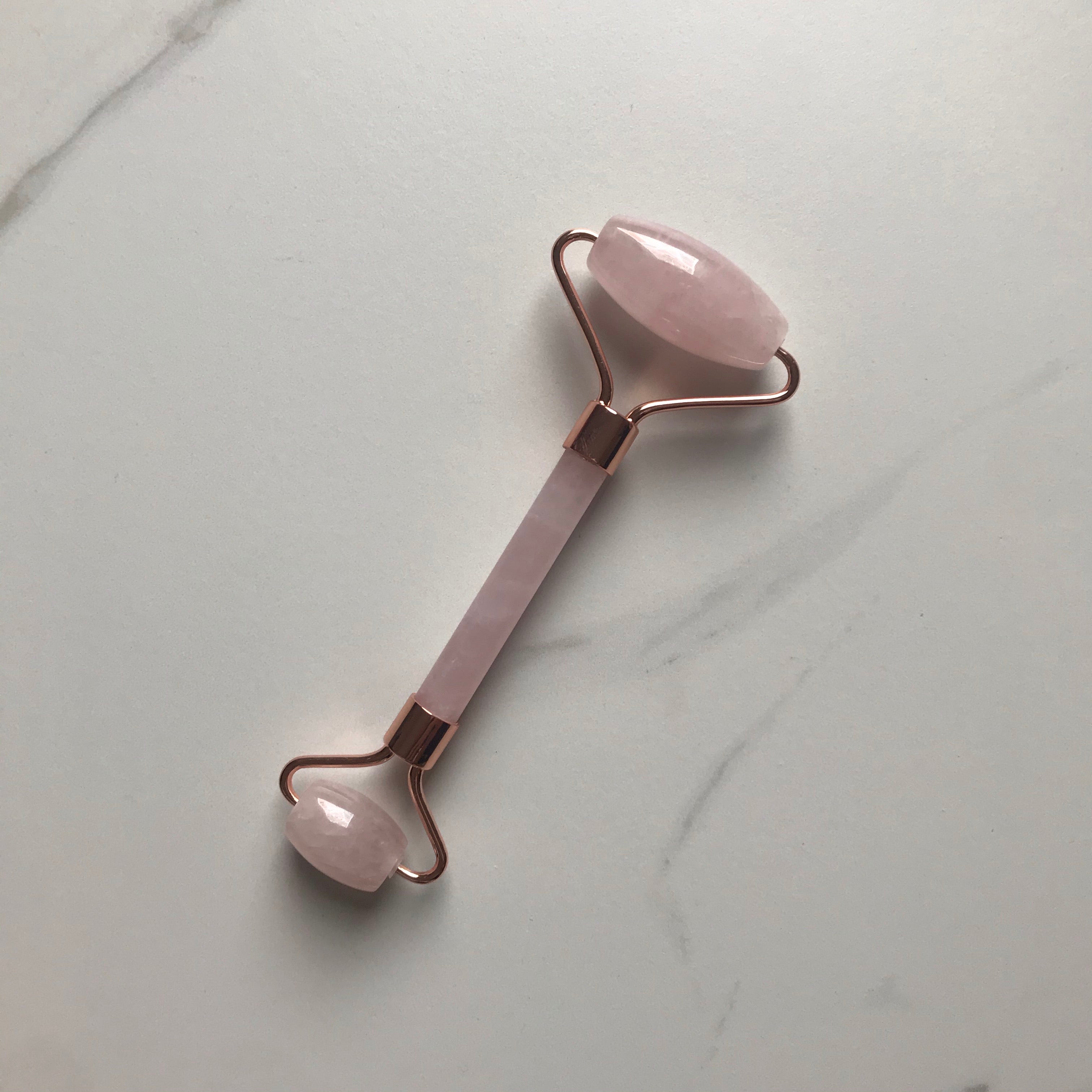 Rose quartz facial roller